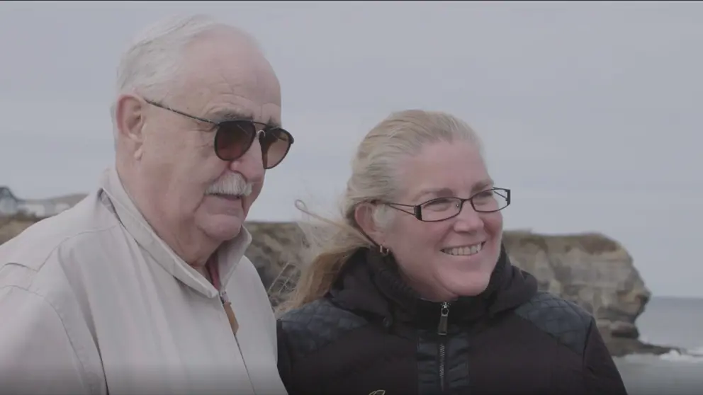 Weldon and Nancy smiling on the wharf in Glace Bay, NS.